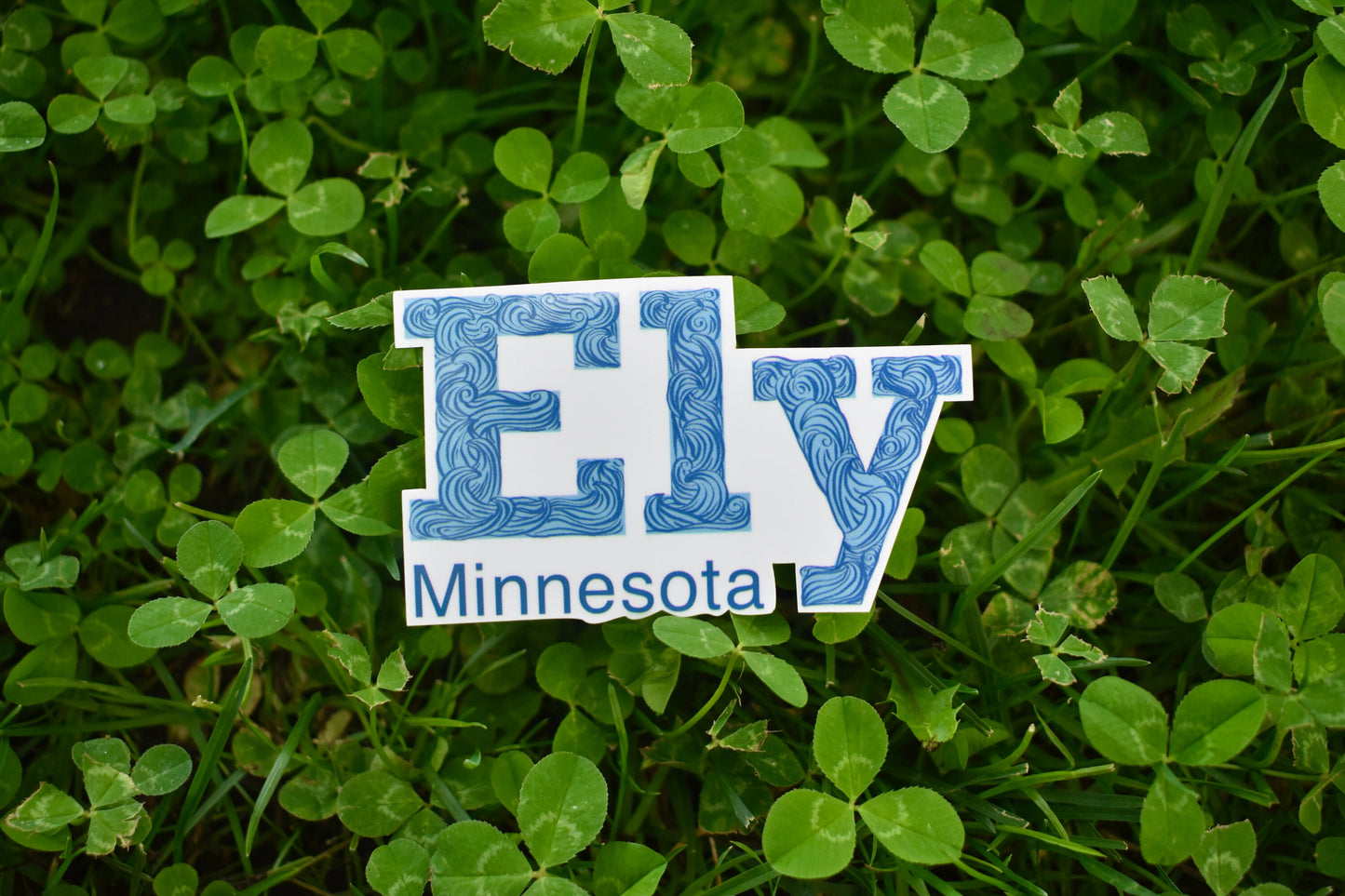 Ely Minnesota Sticker: Waterproof Waves Decal (3.1" x 1.9")